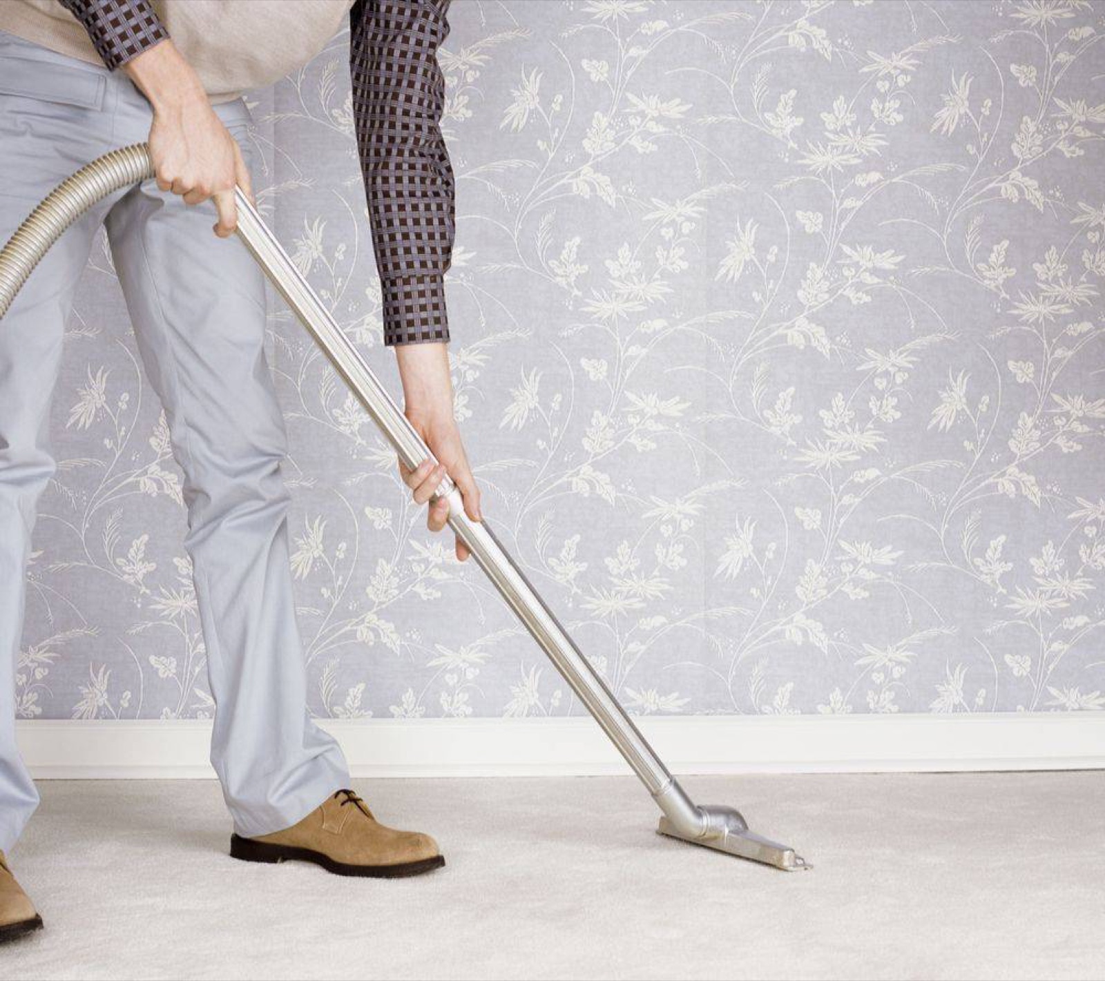 Carpet being cleaned with hot water extraction